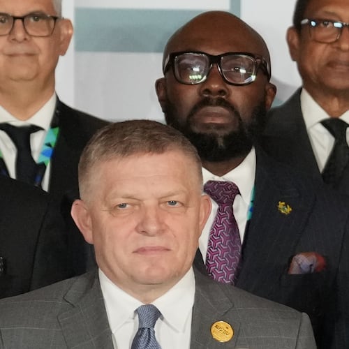 In this Monday, Nov. 24, 2025 photo, Slovakia's Prime Minister Robert Fico, center, poses for a group photo during of the African Union-European Union summit in Luanda, Angola. (AP Photo/Thibault Camus)