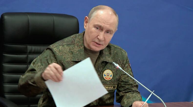 In this image taken from video provided by Russian Presidential Press Service on Friday, July 3, 2026, Russian President Vladimir Putin while visiting one of the command posts of the Joint Group of the Russian Forces, in an undisclosed location. (Russian Presidential Press Service via AP)