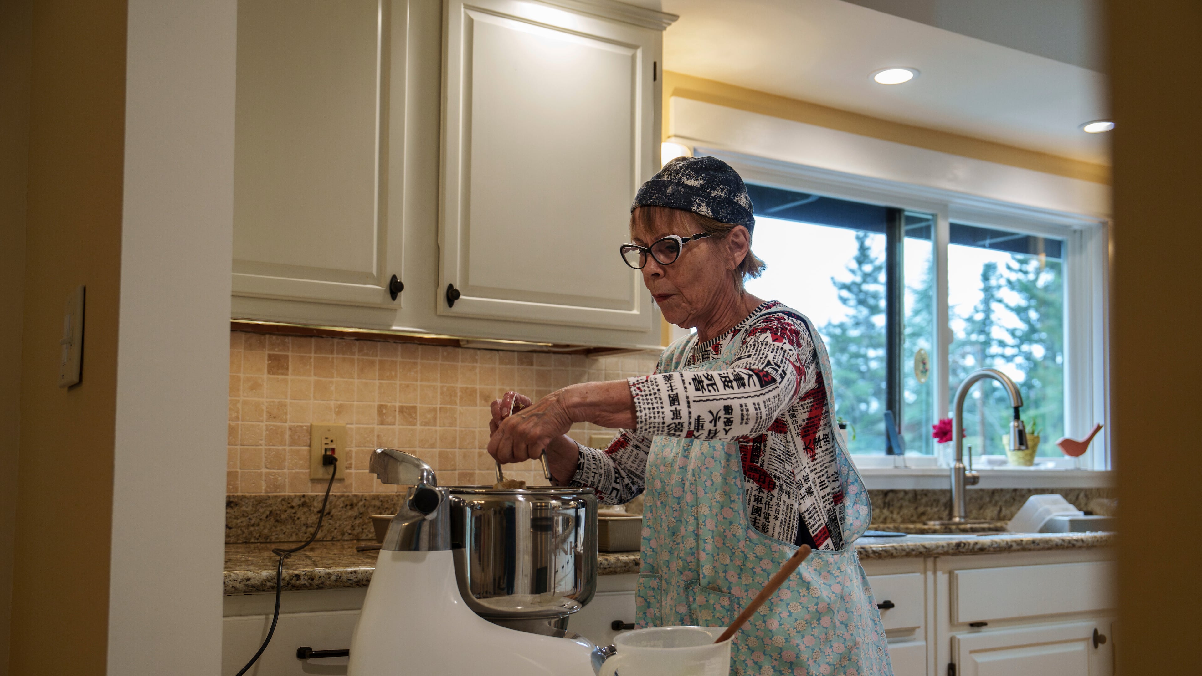 Cheryl Ewaldsen bakes bread for Community Loaves at her home in Edmonds, Wash., Saturday, Sept. 6, 2025. (AP Photo/Annika Hammerschlag)