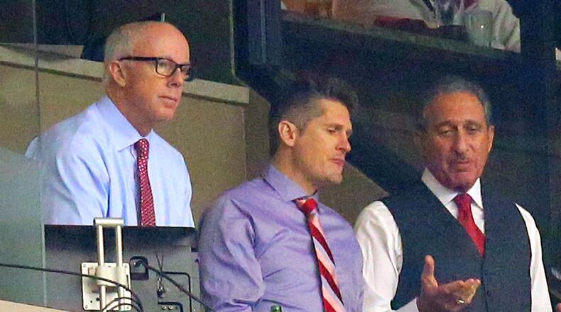Falcons President Rich McKay (from left), General Manager Thomas Dimitroff and owner Arthur Blank watch the Falcons play the Buccaneers at the Georgia Dome in Atlanta in December. Curtis Compton, ccompton@ajc.com