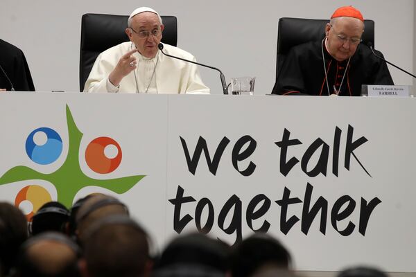 FILE - Pope Francis, left, flanked by Cardinal Kevin Farrell, delivers a speech at the Mater Ecclesiae college in Rome, March 19, 2018. (AP Photo/Alessandra Tarantino, File)