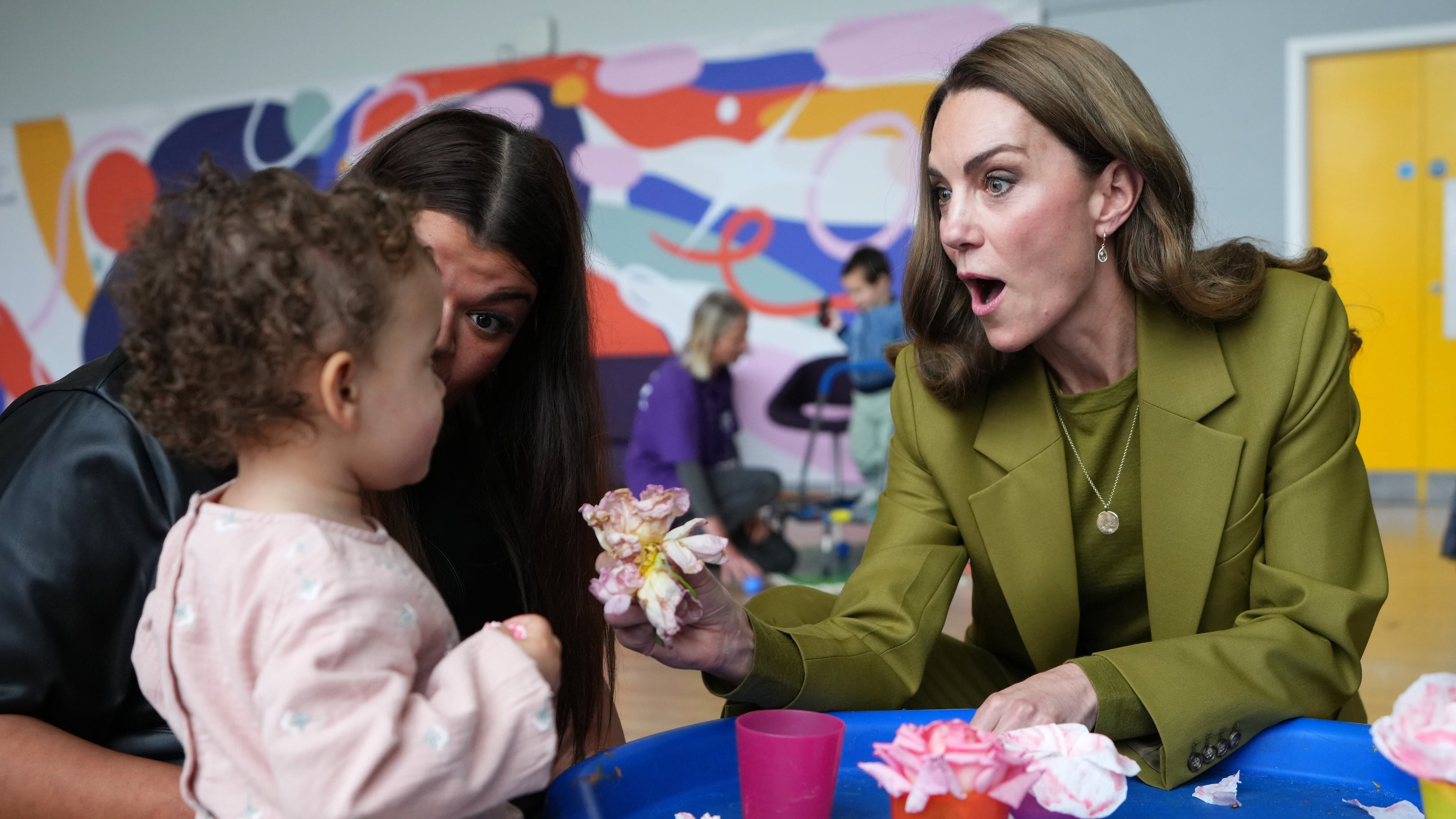 Kate, Princess of Wales interacts with children as she visits Home-Start Oxford to meet and talk to families, and the volunteers who support them, in Oxford, England, Thursday, Oct. 9, 2025. (AP Photo/Kirsty Wigglesworth, Pool)