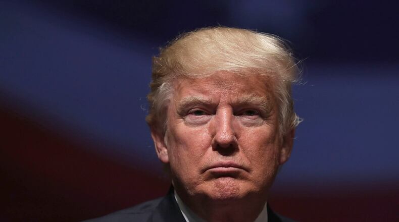 VIRGINIA BEACH, VA - SEPTEMBER 06: Republican presidential nominee Donald Trump pauses during a campaign event September 6, 2016 in Virginia Beach, Virginia. Trump participated in a discussion with retired Army Lieutenant General Michael Flynn. (Photo by Alex Wong/Getty Images)