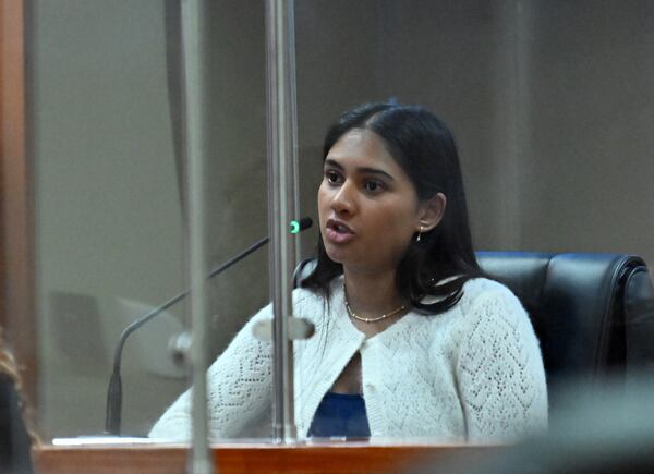 Ananya Rao, daughter of Sumanth and Anindita Rao, testifies on the witness stand during a hearing before Superior Court Judge Tangela Barrie at DeKalb County Courthouse in April 2026.  (Hyosub Shin/AJC)
