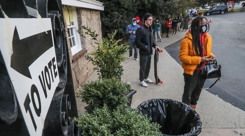 November 3, 2020 Atlanta: Voters line up to vote at Park Tavern in Atlanta on Tuesday, Nov. 3, 2020. Voters lined up outside polling places Tuesday morning to be among the first to cast their votes on a crucial Election Day. It’s expected to be the biggest day of voting in Georgia, with turnout reaching as high as 2 million. Another 3.9 million people already cast early or absentee ballots. Some told The Atlanta Journal Constitution that they expect social unrest whether Biden or Trump wins the election. (John Spink / John.Spink@ajc.com)