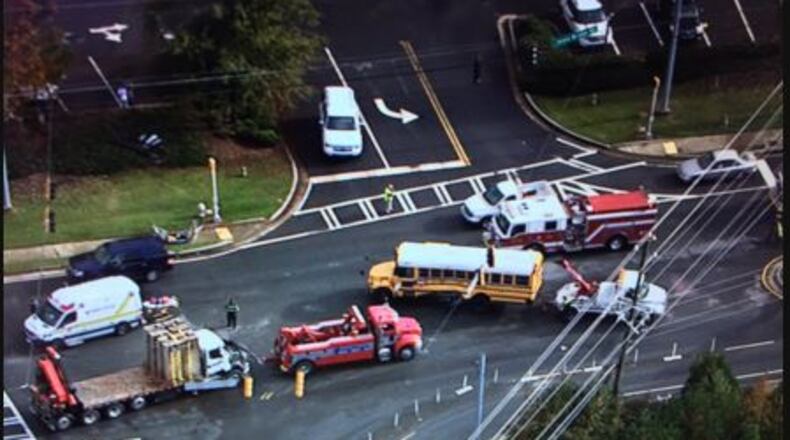A Fulton County school bus was involved in a crash on Jones Bridge Road at Douglas Road in Johns Creek on Friday, Nov. 6, 2015. (Channel 2 Action News)