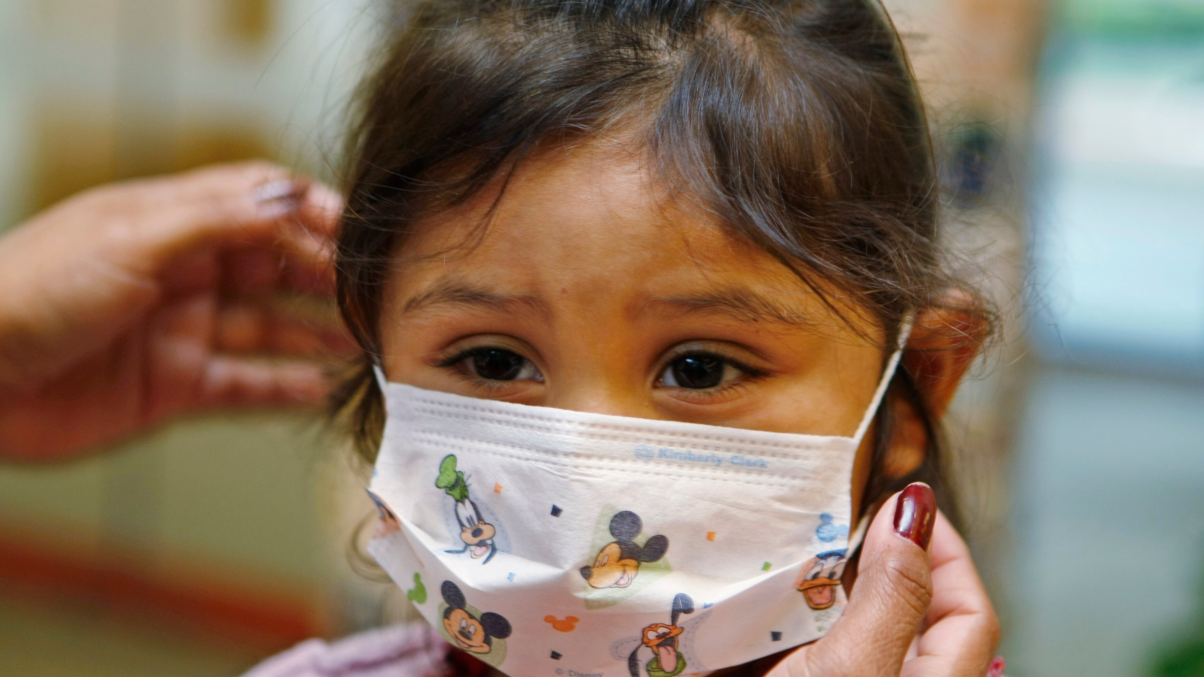 FILE - Lucile Packard Children's Hospital at Stanford visitor Sheila Garcia, 3, wears before visiting a patient at the hospital in Palo Alto, Calif., Oct. 19, 2009. (AP Photo/Paul Sakuma, File)