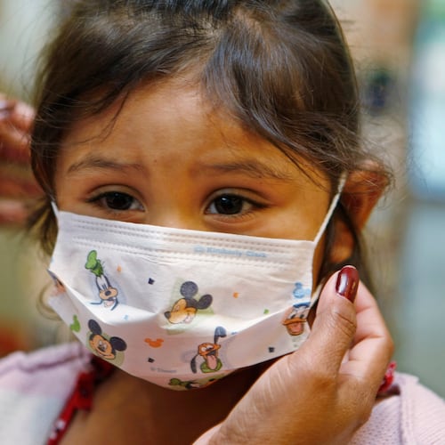 FILE - Lucile Packard Children's Hospital at Stanford visitor Sheila Garcia, 3, wears before visiting a patient at the hospital in Palo Alto, Calif., Oct. 19, 2009. (AP Photo/Paul Sakuma, File)