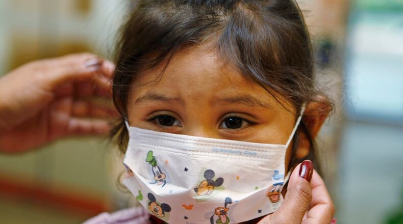 FILE - Lucile Packard Children's Hospital at Stanford visitor Sheila Garcia, 3, wears before visiting a patient at the hospital in Palo Alto, Calif., Oct. 19, 2009. (AP Photo/Paul Sakuma, File)