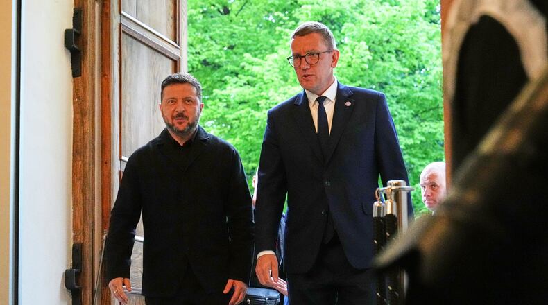Estonia's Prime Minister Kristen Michal, right, and Ukraine's President Volodymyr Zelenskyy attend a Nordic and Baltic countries meeting in Tallinn, Estonia, Tuesday, June 9, 2026. (AP Photo/Sergei Grits)