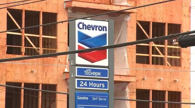 A woman said she was attacked with pepper spray after a fight over a Buckhead gas pump.