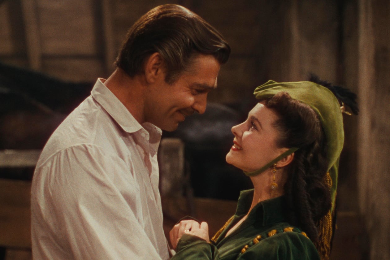Clark Gable, left, as Rhett Butler, and Vivien Leigh as Scarlett O'Hara in a scene from the film "Gone With the Wind." (Warner Bros. Home Entertainment/AP file_