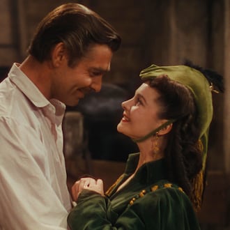 Clark Gable, left, as Rhett Butler, and Vivien Leigh as Scarlett O'Hara in a scene from the film "Gone With the Wind." (Warner Bros. Home Entertainment/AP file_