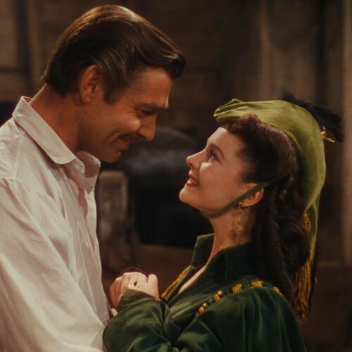 Clark Gable, left, as Rhett Butler, and Vivien Leigh as Scarlett O'Hara in a scene from the film "Gone With the Wind." (Warner Bros. Home Entertainment/AP file_