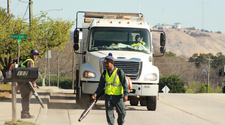 Since March 11, DeKalb County crews have cleaned up more than 200 tons of grass, trash and other debris from 40 miles of roads. CONTRIBUTED