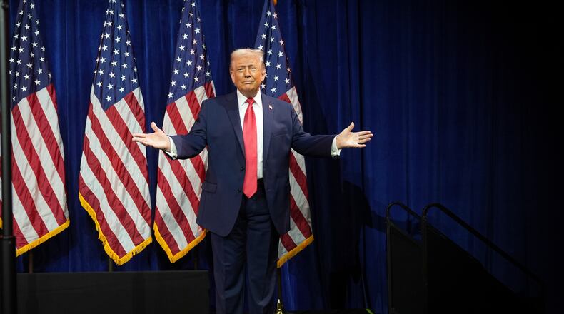 President Donald Trump arrives at an annual policy retreat, Tuesday, Jan. 6, 2026, in Washington. (AP Photo/Evan Vucci)