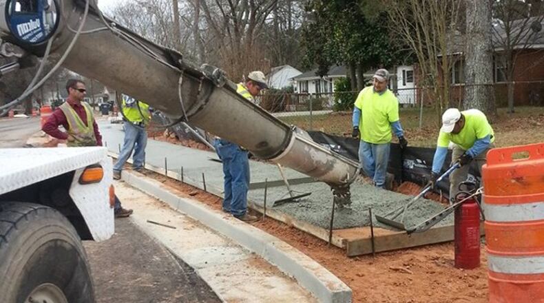 Alpharetta has awarded a contract to construct two sidewalk segments along North Point Court and Hembree Road. AJC FILE