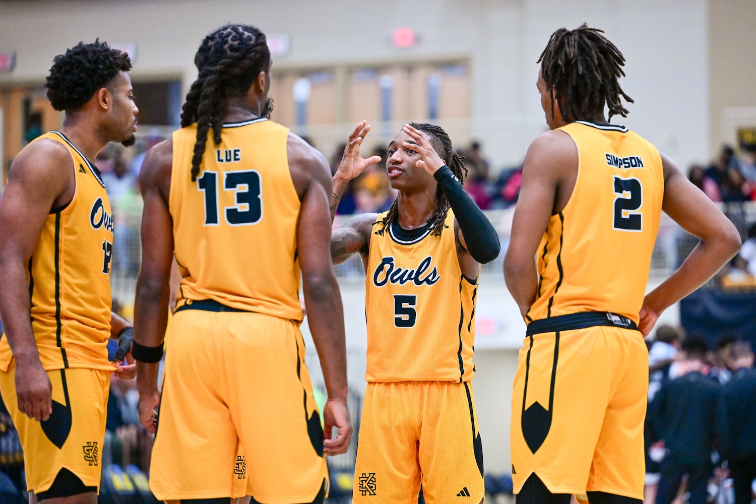 Kennesaw State guard Simeon Cottle (second from right) gives his Owl teammates a pep talk during the second half of a game Sunday, Nov. 16, 2025 at Kennesaw State University. (Daniel Varnado for the AJC)