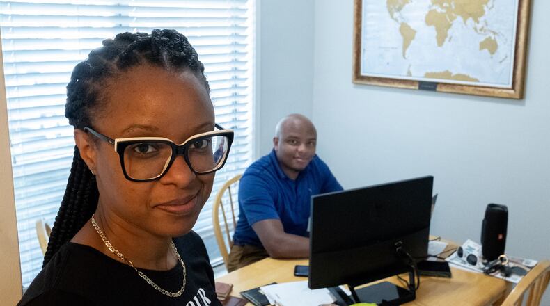 Renee Morris and Justin Nicks drastically scaled back the size of their upcoming wedding due to the coronavirus pandemic and are using the money they would have spent on their wedding to help buy a town home. (Ben Gray for The Atlanta Journal-Constitution)