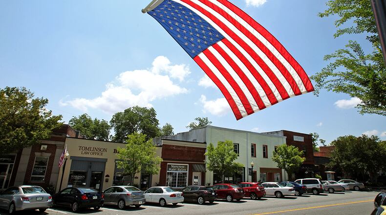 Welcome to Norcross, the second-oldest city in Gwinnett County and one of the cities on the National Register of Historic Places. This photo of the downtown historic district is from 2012. (Jason Getz / AJC file)