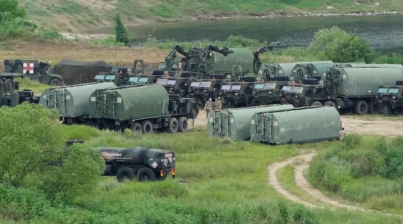 U.S. Army's armored vehicles gather to cross a river at a training field in Yeoncheon, South Korea, near the border with North Korea, Monday, Aug. 17, 2026. (AP Photo/Ahn Young-joon)