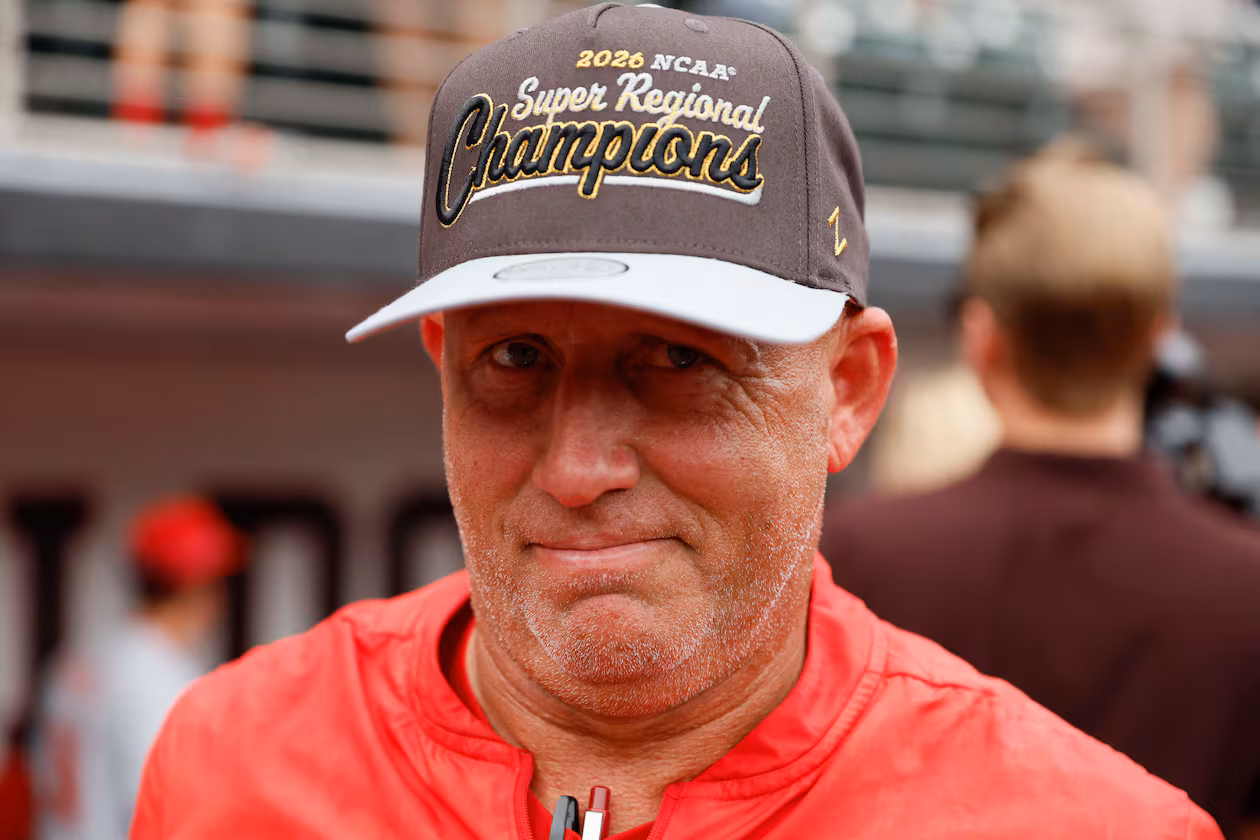 Georgia Bulldogs head coach Wes Johnson reacts while wearing his championship hat as he celebrates with his team after winning the NCAA Super Regional series, defeating the Mississippi State Bulldogs 11-9 at Foley Field on Sunday, June 7, 2026, in Athens.
Miguel Martinez/AJC)