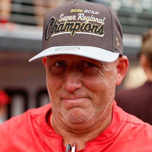 Georgia Bulldogs head coach Wes Johnson reacts while wearing his championship hat as he celebrates with his team after winning the NCAA Super Regional series, defeating the Mississippi State Bulldogs 11-9 at Foley Field on Sunday, June 7, 2026, in Athens.
Miguel Martinez/AJC)