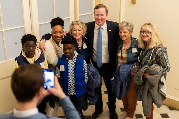 U.S. Rep. Brian Jack, R-Peachtree City, poses for photos with constituents during a tour of the U.S. Capitol in Washington, DC on April 11, 2025. (Nathan Posner for the Atlanta Journal-Constitution)