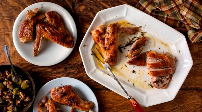 A roast turkey in New York, Oct. 24, 2015. When cooking for a large group at Thanksgiving, cooking one showpiece turkey and a pan full of turkey parts is easier and less time consuming than trying to roast two or more full birds.