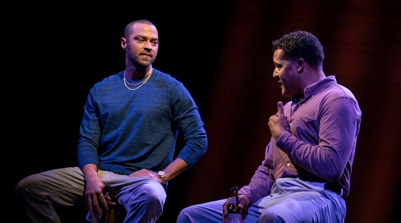 Jesse Williams (left) and Brandon J. Dirden in "Take Me Out," opening on Broadway on Monday night. The play concerns a mixed-race baseball star who decides to come out as gay. (Photos by Joan Marcus)