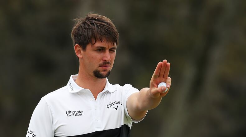 Former Georgia Tech player Ollie Schniederjans does some engineering of a putt during the third round of the Players  Championship. (Photo by Gregory Shamus/Getty Images)