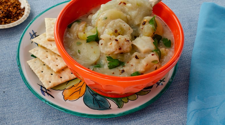 Cauliflower puree lends this dairy-free fish chowder a creamy texture without the heaviness of cream. (Virginia Willis for The Atlanta Journal-Constitution)