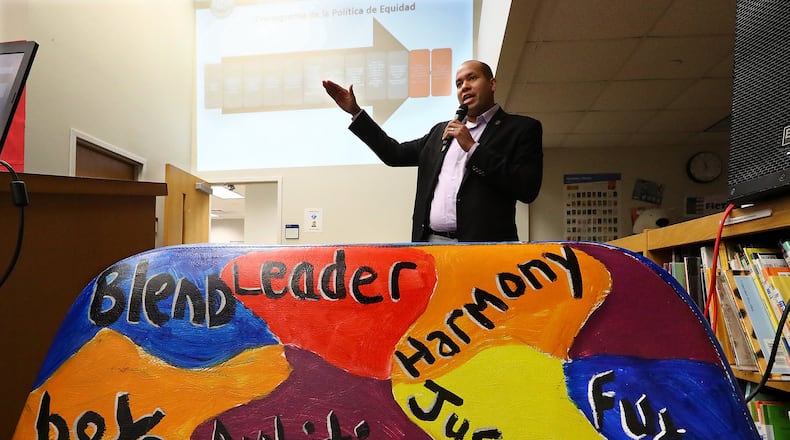Atlanta school board Chairman Jason Esteves answers questions from the audience at a presentation on the “Excellent Schools Project” during a community meeting at Hope-Hill Elementary School on Monday, Feb. 25, 2019, in Atlanta.