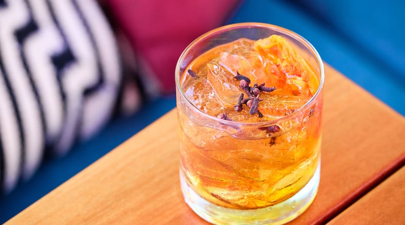 Gypsy Kitchen's Smoke in the Orchard combines Slow & Low rye, peach liqueur and orange bitters. Courtesy of Gypsy Kitchen