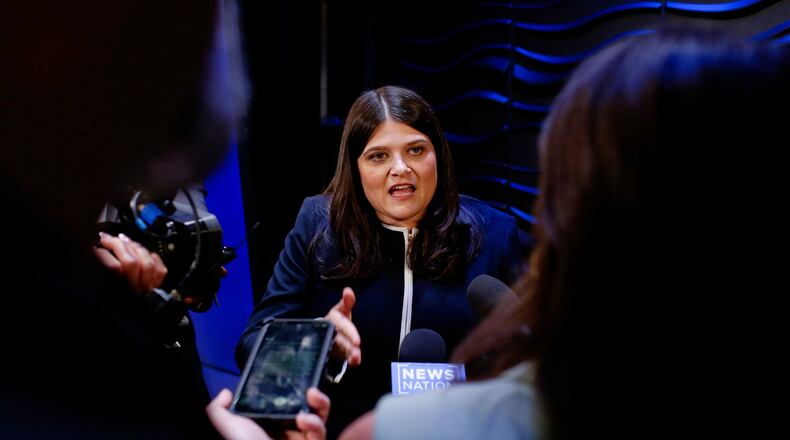 Michigan U.S. Sen. candidate, Rep. Haley Stevens, D-Mich., speaks with media after a debate at WoodTV studios on Tuesday, July 7, 2026, in Grand Rapids, Mich. (AP Photo/Kristen Norman)