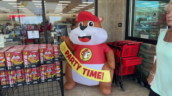 An inflatable Buc-ee's mascot greets customers at the beaver-centric chain's store along I-75 in Warner Robins. (Joe Kovac Jr./AJC)