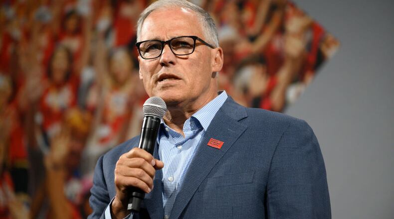 Members of the Washington State Republican Party handed over a petition Friday demanding that Gov. Jay Inslee reimburse taxpayers for part of his presidential campaign.