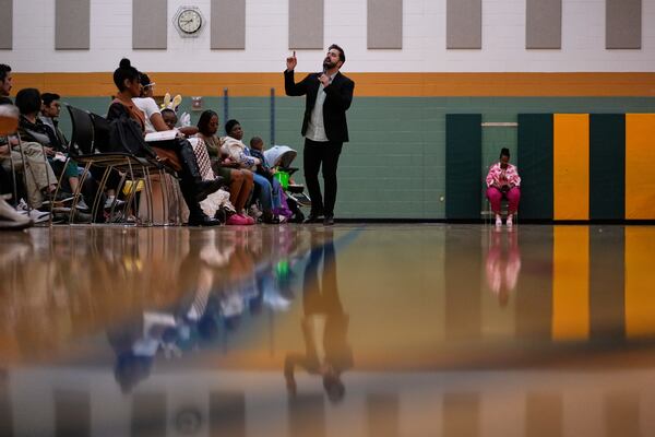 River Church Cincinnati pastor Cory Bowman, who is Vice President JD Vance's half brother and Cincinnati mayoral candidate, preaches during Easter worship service in the Hays Porter Elementary School gym Sunday, April 20, 2025, in Cincinnati. (AP Photo/Carolyn Kaster)