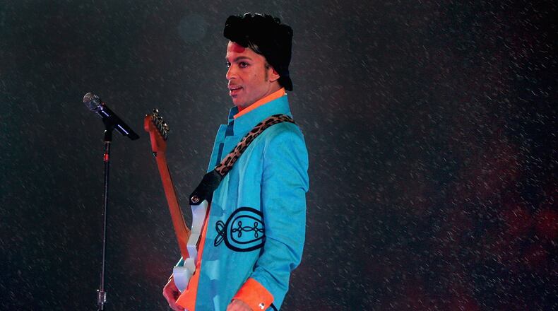 MIAMI GARDENS, FL - FEBRUARY 04: Prince performs during the 'Pepsi Halftime Show' at Super Bowl XLI between the Indianapolis Colts and the Chicago Bears on February 4, 2007 at Dolphin Stadium in Miami Gardens, Florida. (Photo by Jed Jacobsohn/Getty Images)