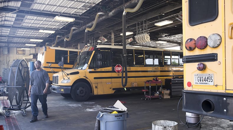 Atlanta Public Schools plans to swap out some of its diesel school buses with 25 electric buses. (Alyssa Pointer/AJC FILE PHOTO)