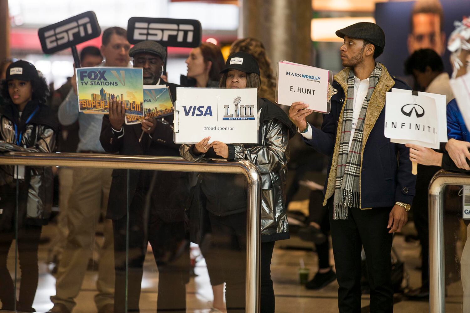 PHOTOS: Fans flock into Atlanta airport for Super Bowl