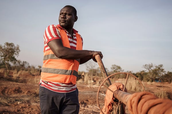 Doudou Dramé, president of the Observatoire Territoriale du Secteur Extractif, an organization that advocates for safer conditions for gold miners, poses for a portrait at a mining site in the Kedougou region of Senegal on Thursday, Jan. 16, 2025. (AP Photo/Annika Hammerschlag)