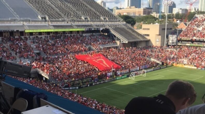 Atlanta United unveils a tifo before Saturday’s game against Colorado Rapids at Georgia Tech.