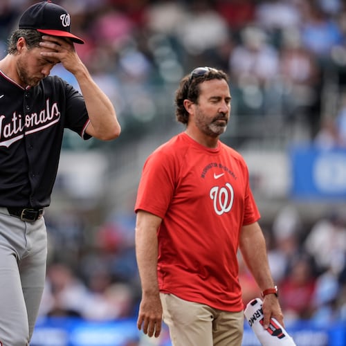 Washington Nationals pitcher Jake Irvin walks off the mound in the sixth inning of a baseball game against the Atlanta Braves, Saturday, May 23, 2026, in Atlanta. (AP Photo/Mike Stewart)