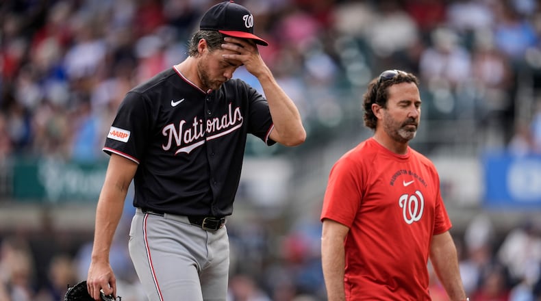 Washington Nationals pitcher Jake Irvin walks off the mound in the sixth inning of a baseball game against the Atlanta Braves, Saturday, May 23, 2026, in Atlanta. (AP Photo/Mike Stewart)