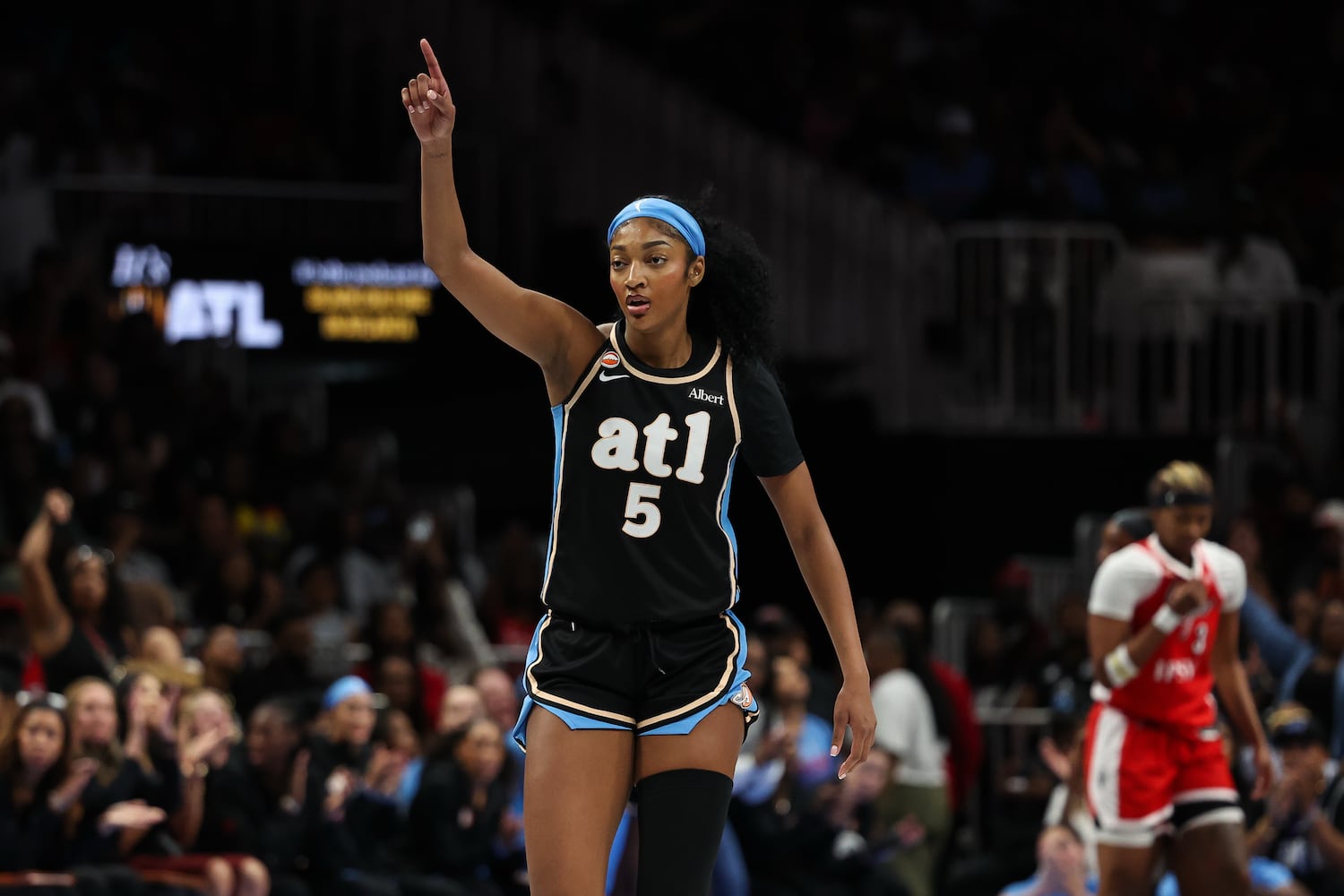 Dream forward Angel Reese reacts during the first half Sunday, May 17, 2026, at State Farm Arena in Atlanta. (Colin Hubbard for the AJC) 
