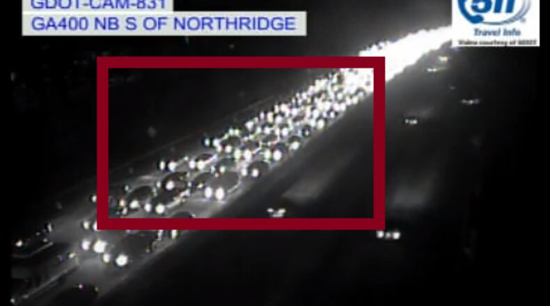 Police are searching for two felony suspects accused of running away from a wreck on Ga. 400 near Northridge Road.