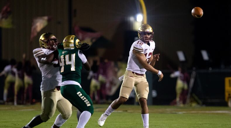 Brookwood quarterback Dylan Lonergan (12) throws the ball during a GHSA high school football game between the Grayson Rams and the Brookwood Broncos at Grayson High School in Loganville, Ga. on Friday, October 22, 2021. (Photo/Jenn Finch)