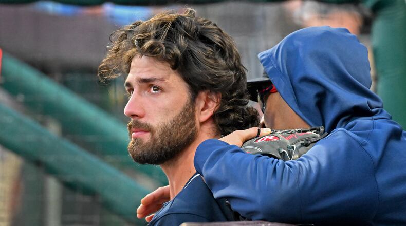 Braves shortstop Dansby Swanson watches from the dugout as the Braves' season ends in Philadelphia. (Hyosub Shin / Hyosub.Shin@ajc.com)