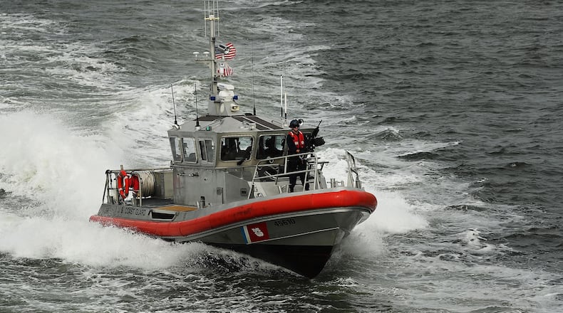 U.S. Coast Guard and border patrol officials said more than two dozen Cuban immigrants landed on a makeshift wooden boat in Miami.
